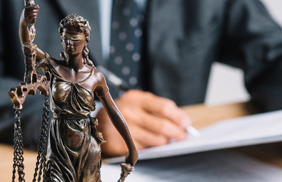 Lady Justice statue on a desk